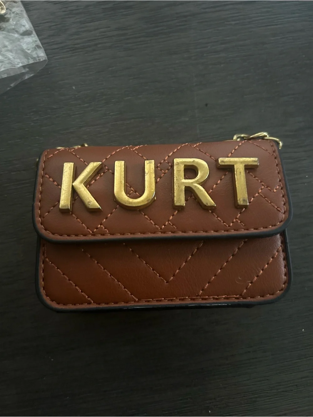 Brown Quilted Mini Crossbody Bag with Gold Lettering